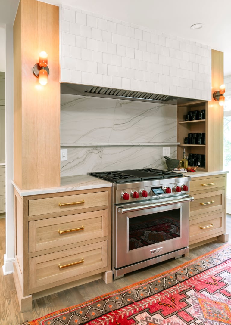 Modern kitchen with white cabinetry and light quartz countertops