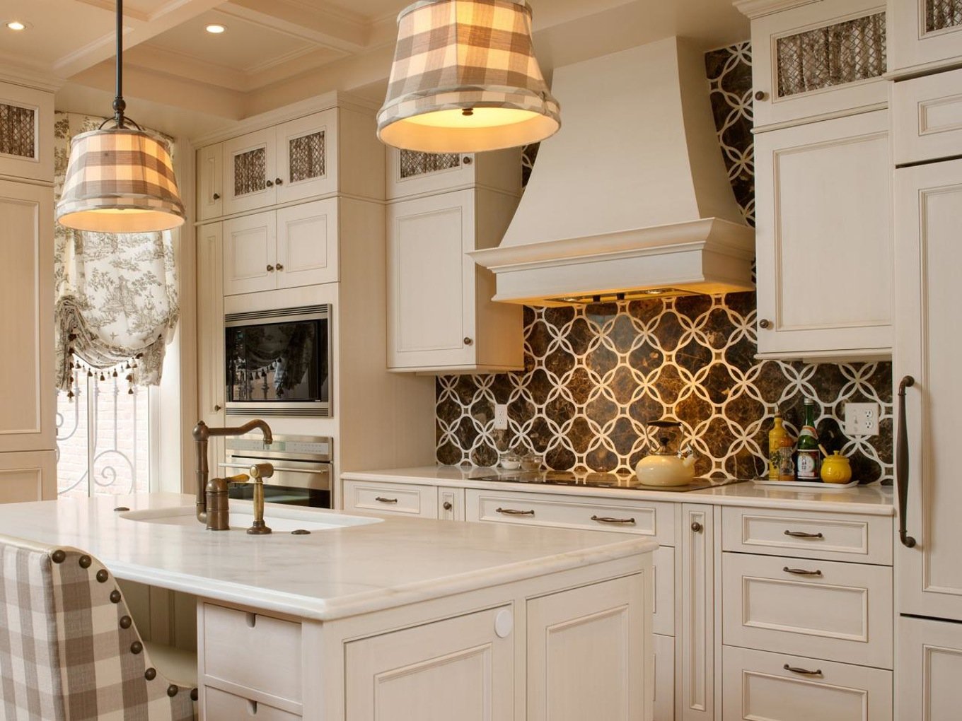 Modern kitchen with stone countertops and cabinetry