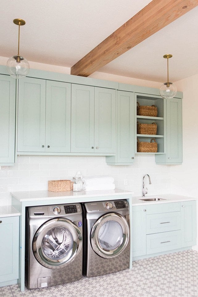Kitchen with stone countertops and cabinetry