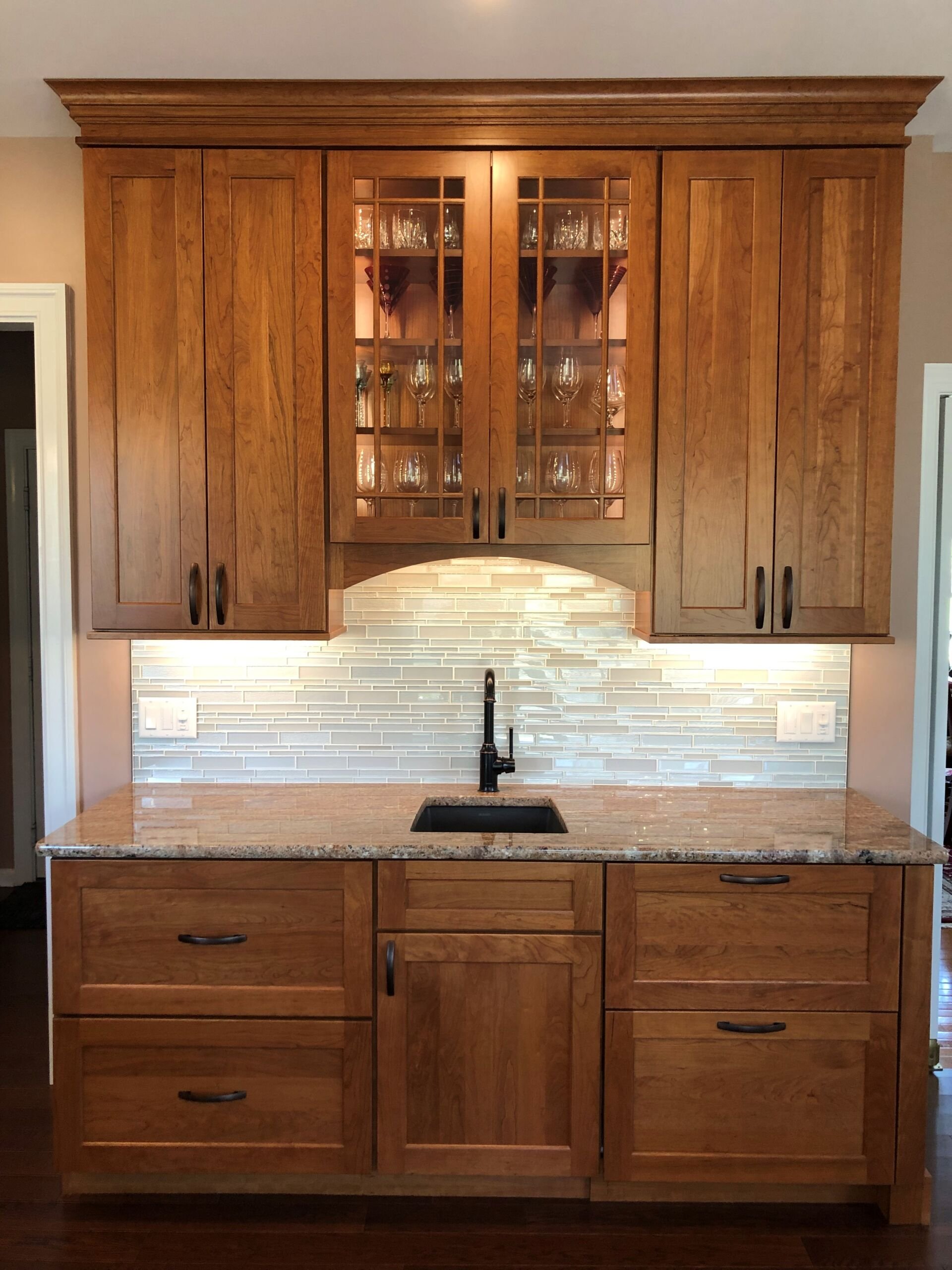 Kitchen with white quartz countertops and modern cabinetry