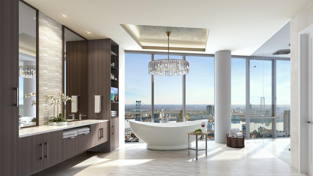 Kitchen with walnut cabinetry and stone countertops