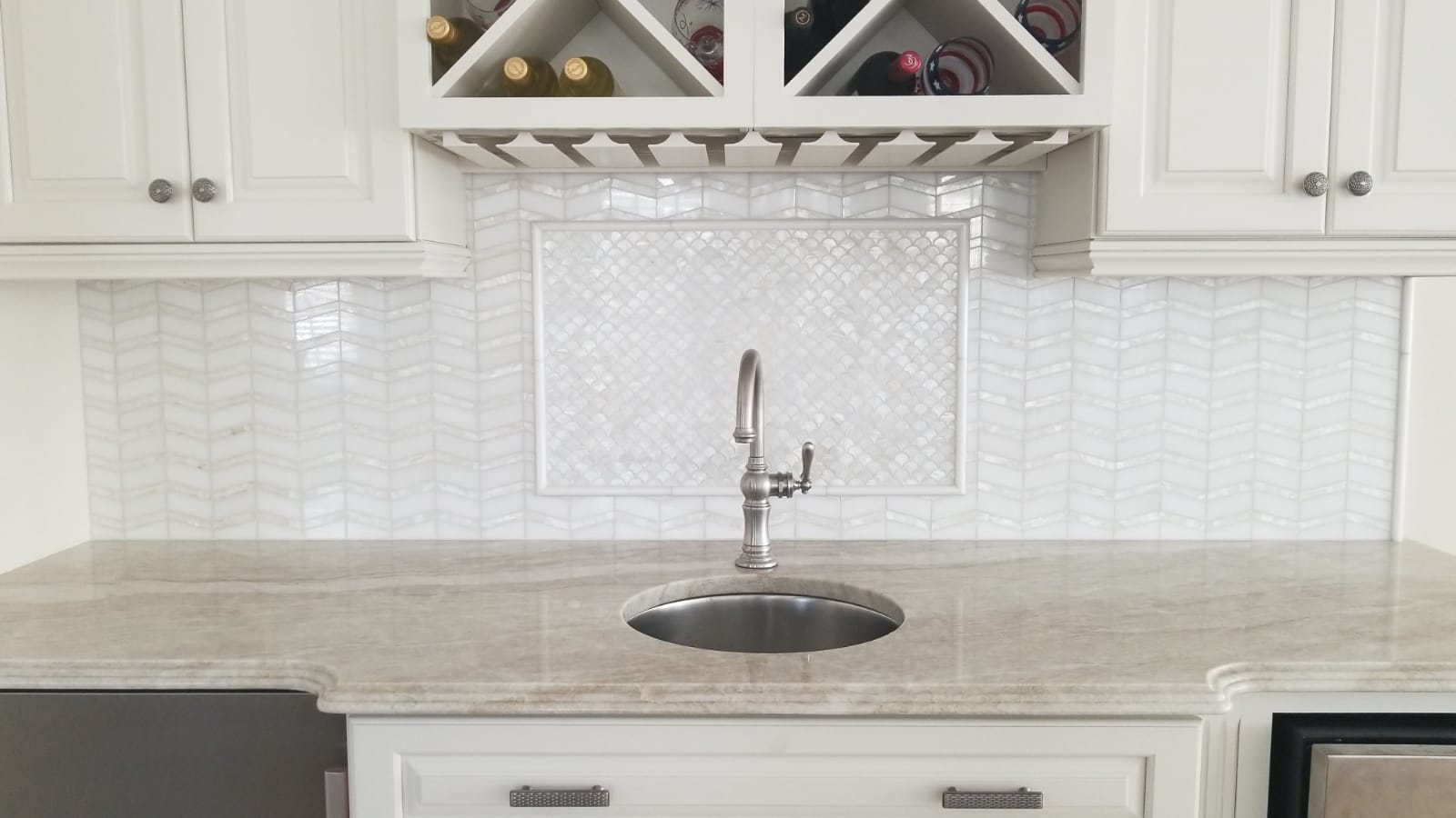 Kitchen backsplash with stone tile and countertop detail