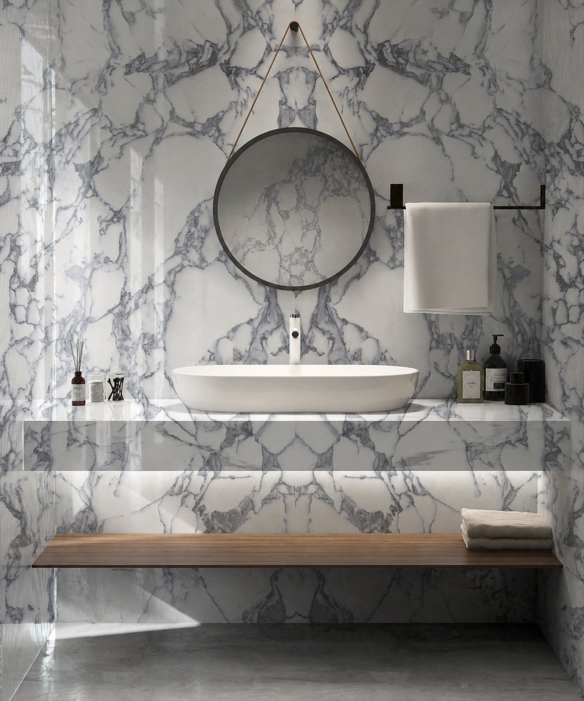Bathroom design with polished Monte Corchia marble tiles featuring grey and white veining