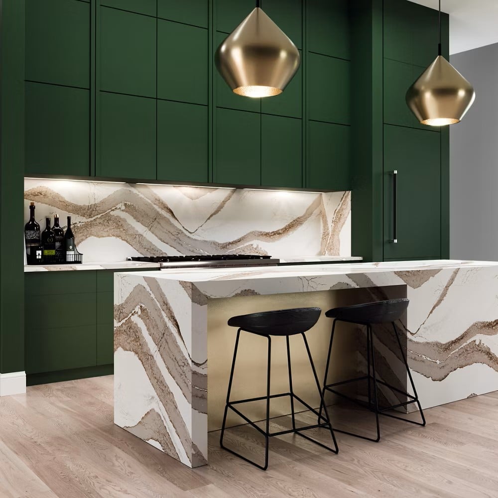Kitchen featuring Cambria Brittanicca Gold quartz countertops with green cabinetry