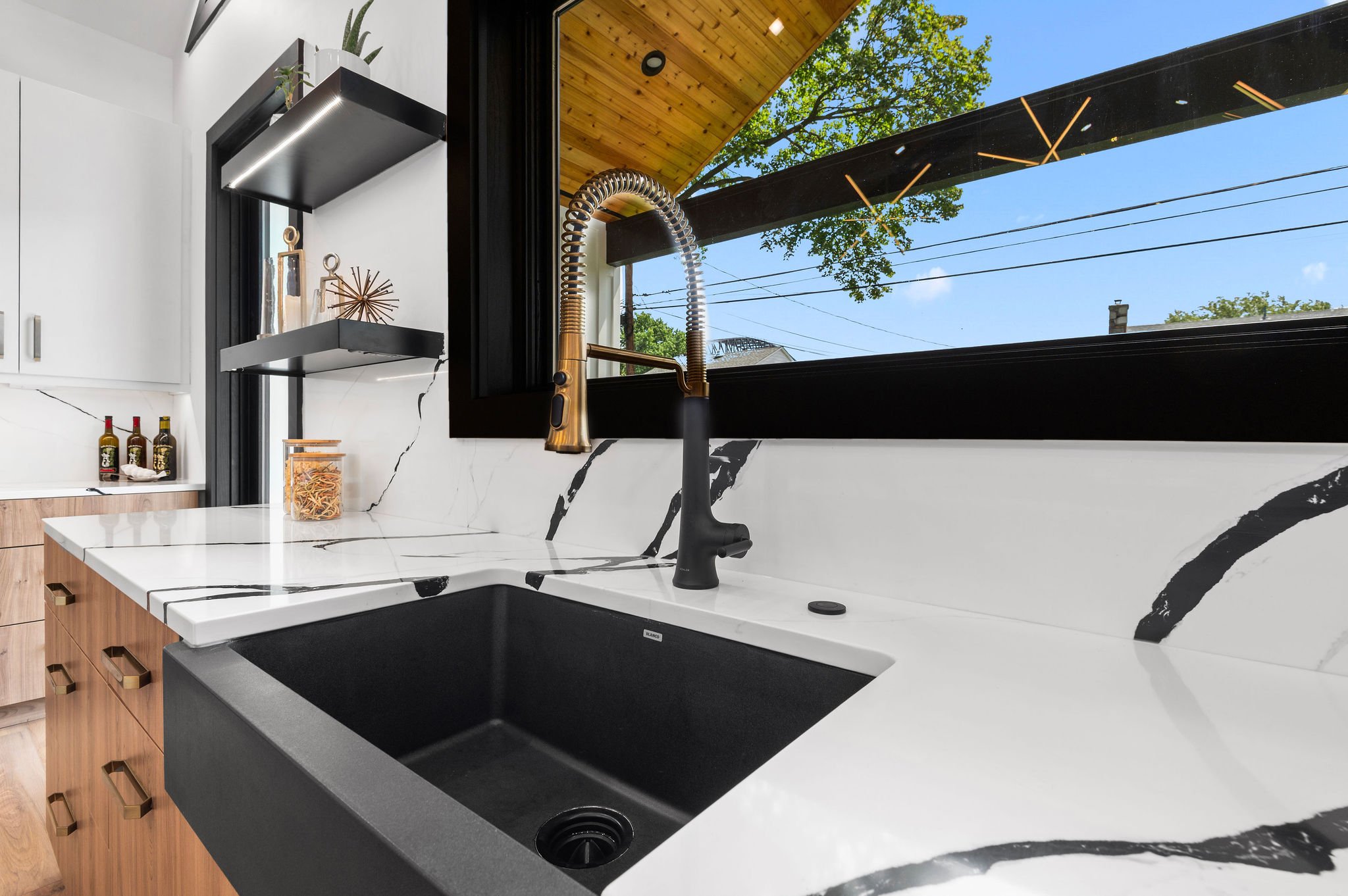 Interior stone showroom displaying large format marble and quartzite slabs
