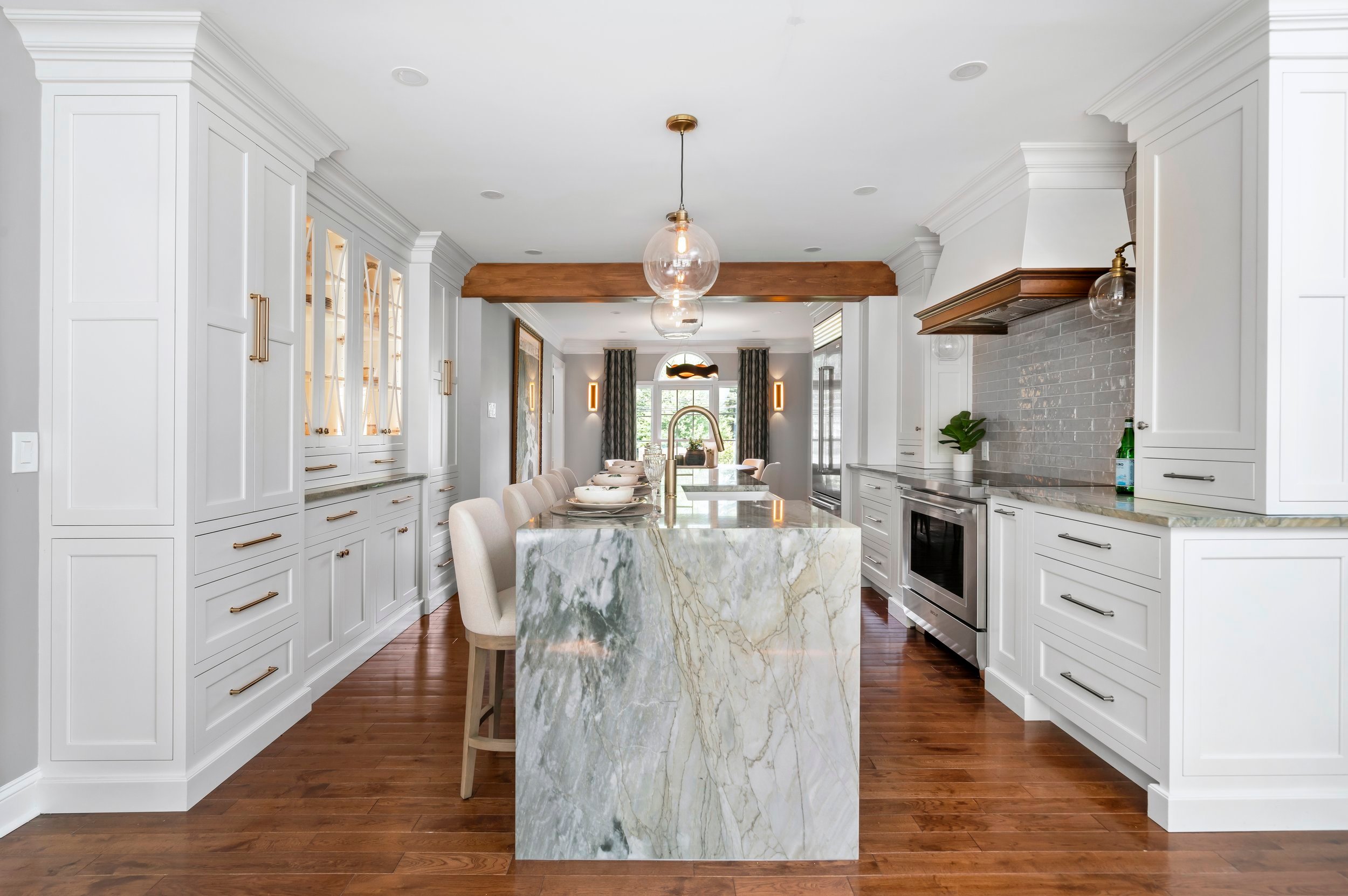 Kitchen with green Santiago quartz countertops and cabinetry