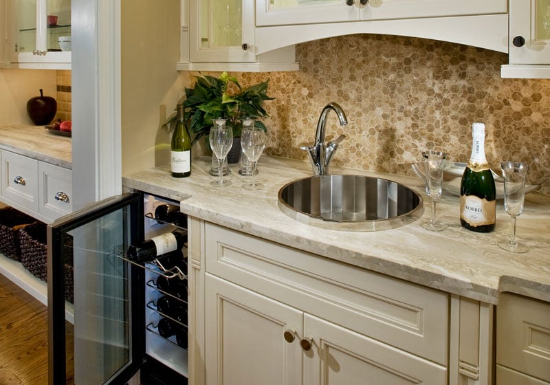 Bar area with stone countertop and modern design