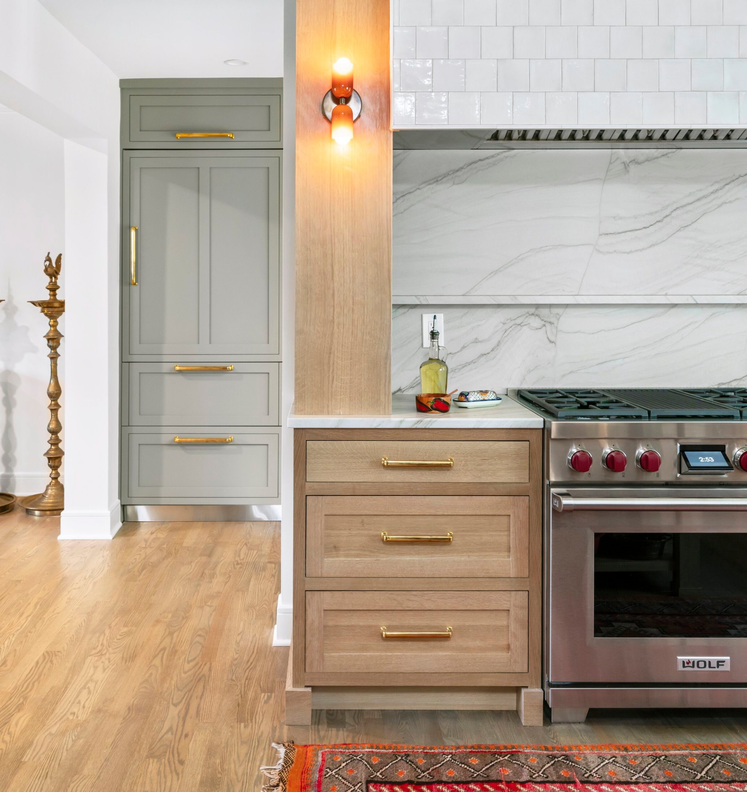 Bright kitchen with Infinity White quartz countertops and white cabinetry