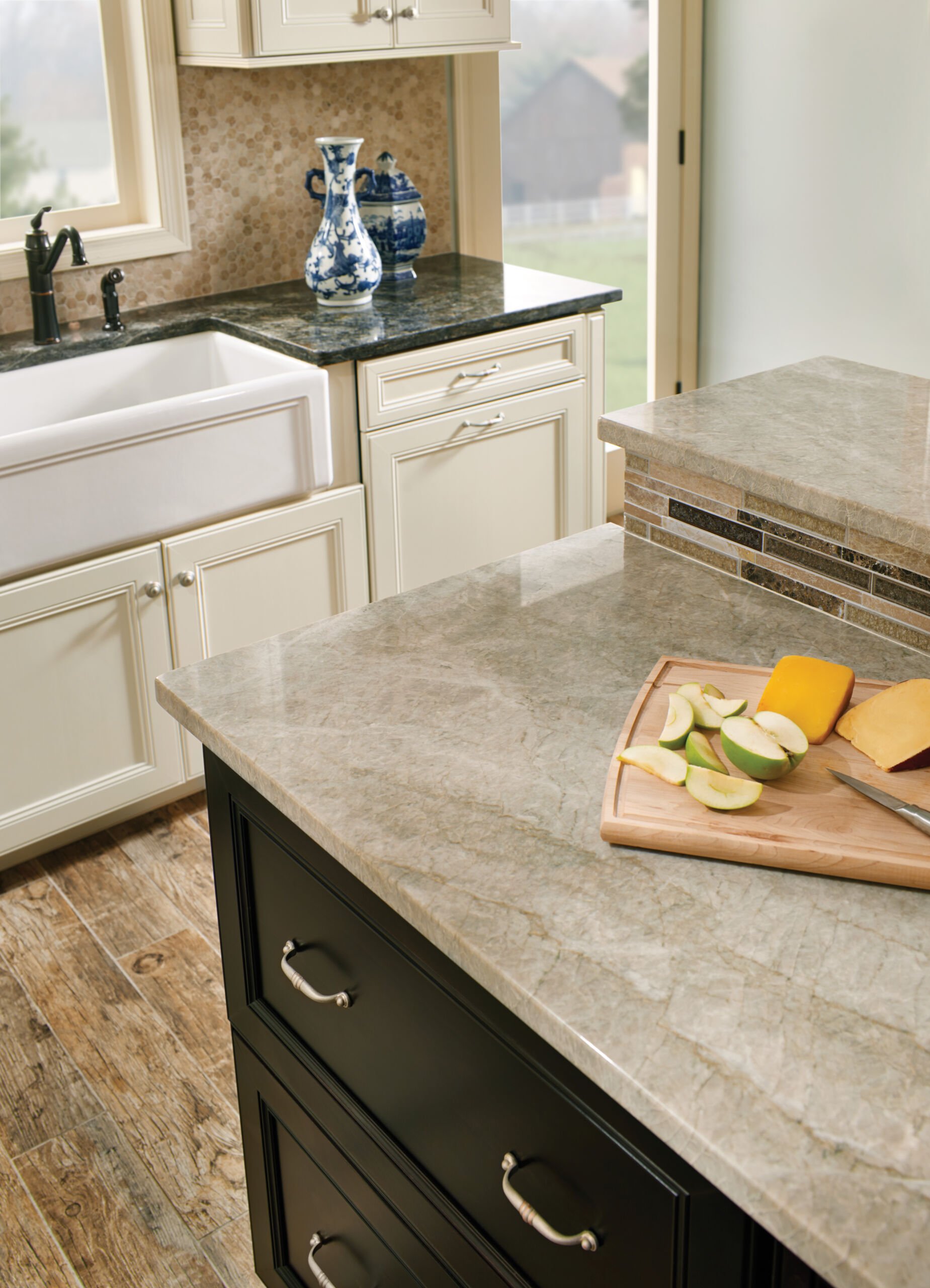 Close-up detail of kitchen countertop with stone surface and cabinet edge