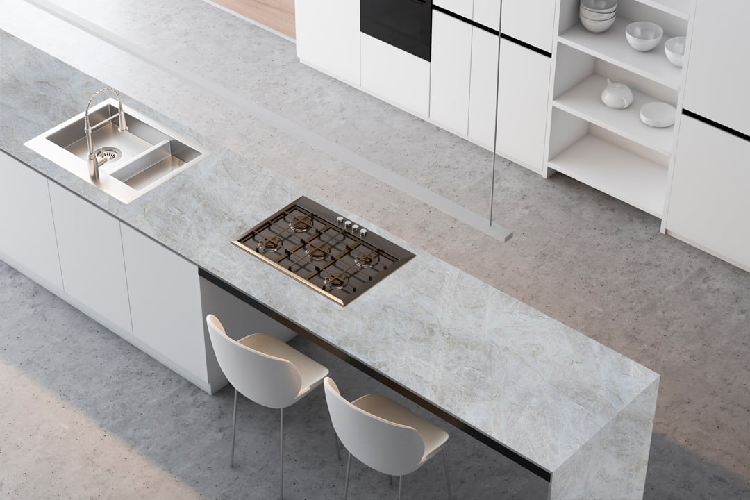 Kitchen with stone countertops and cabinetry