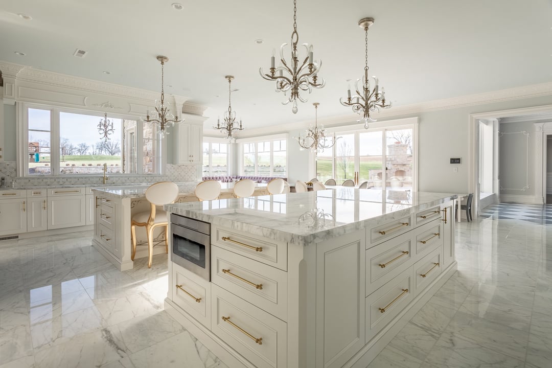 Kitchen island with marble or marble-look stone countertop
