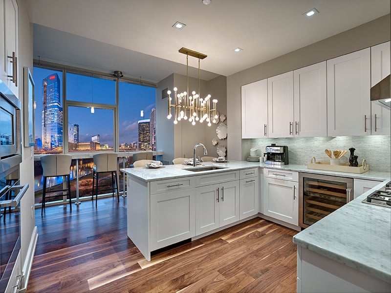 Modern kitchen with stone countertops and high-end cabinetry