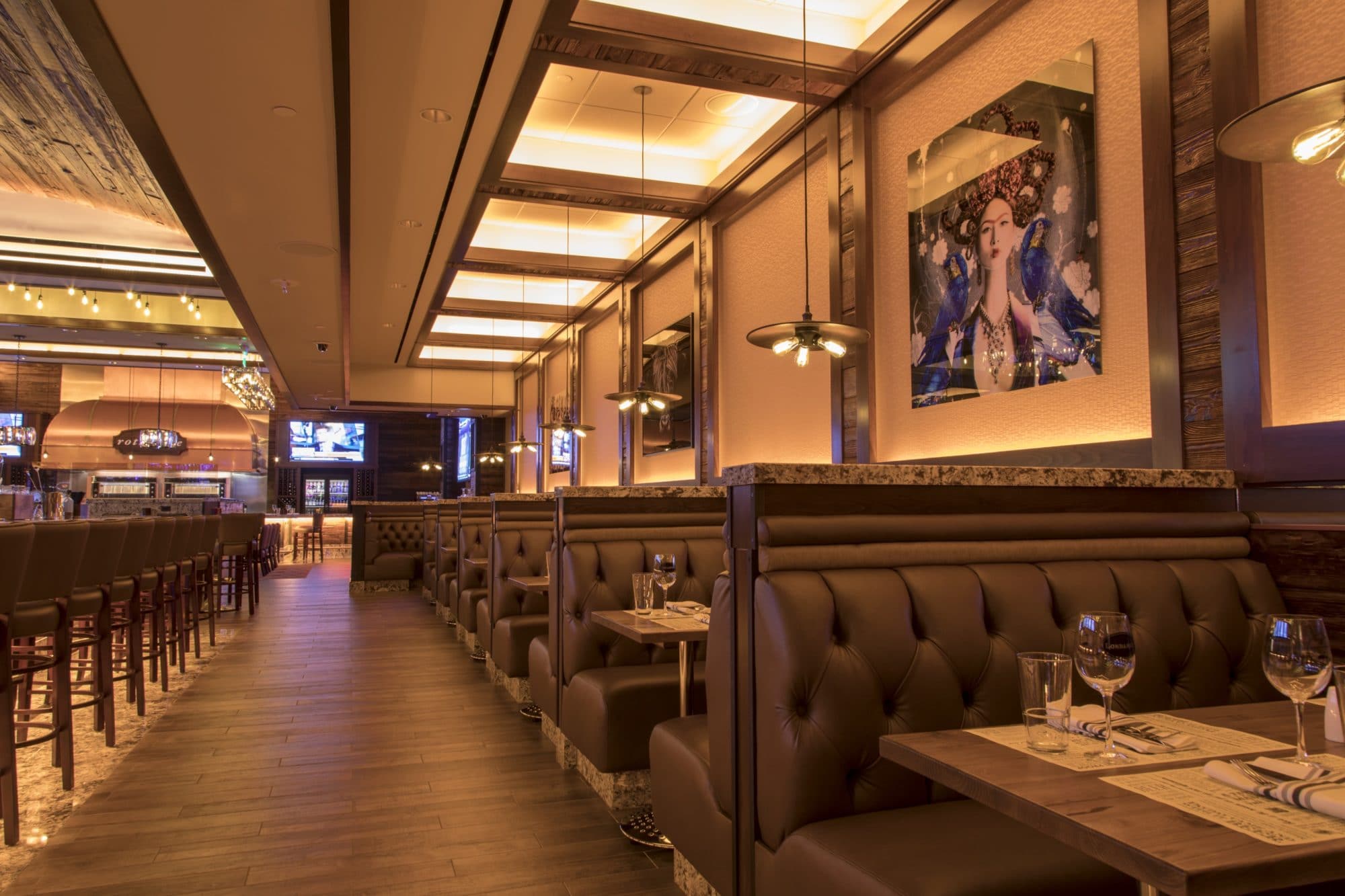Modern bar or hospitality area with stone countertop and stylish finishes
